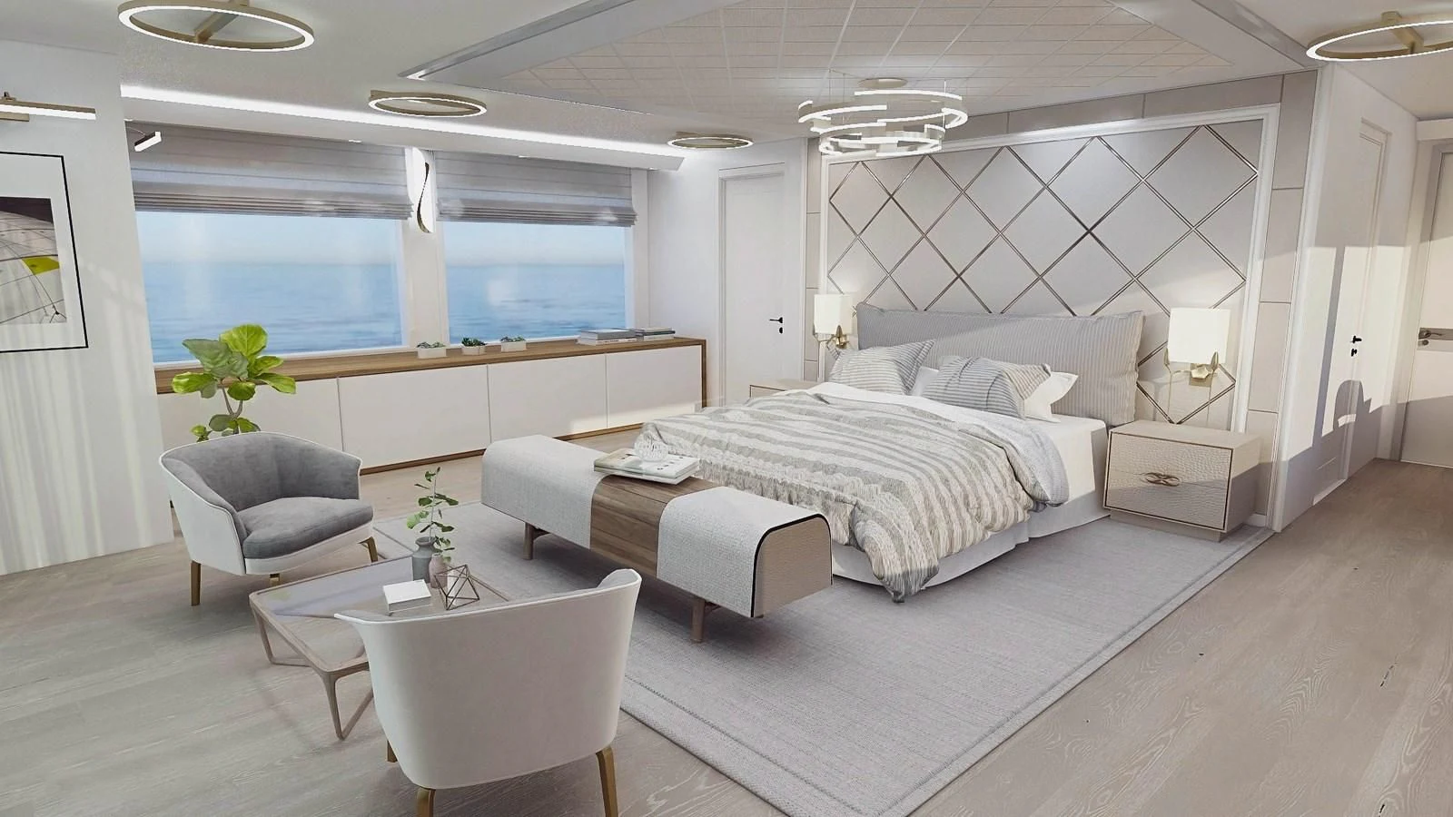 a large white bedroom with a large bed and a chair aboard EXPLORER ICE CLASS Yacht for Sale