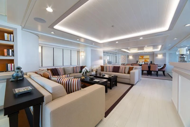 a living room with a couch and a coffee table aboard GIO CHI THE Yacht for Sale