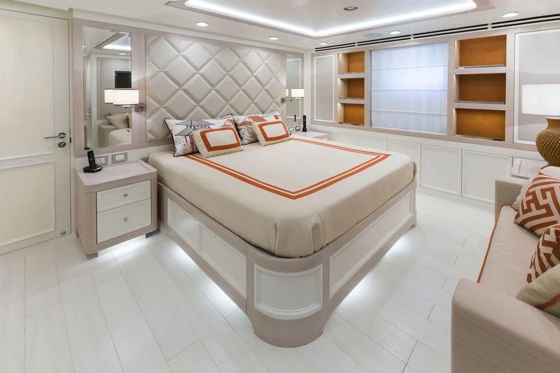 a large bedroom with a large bed aboard GIO CHI THE Yacht for Sale