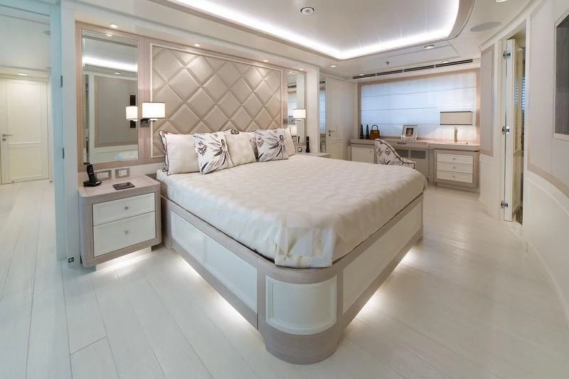 a large bedroom with a large bed aboard GIO CHI THE Yacht for Sale