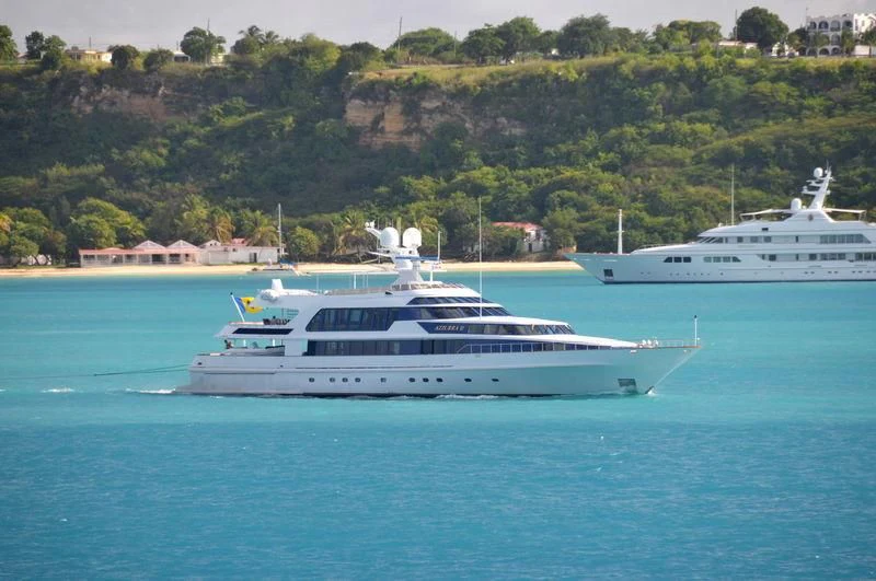 a couple of white boats in the water aboard AZZURRA II Yacht for Sale