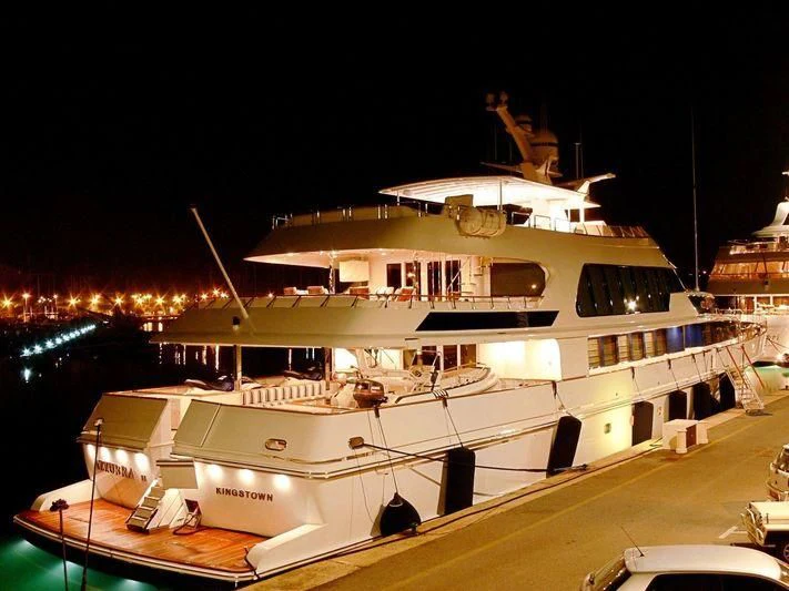 a large white boat at night aboard AZZURRA II Yacht for Sale