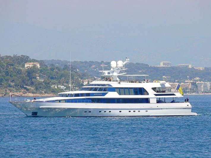 a white yacht in the water aboard AZZURRA II Yacht for Sale