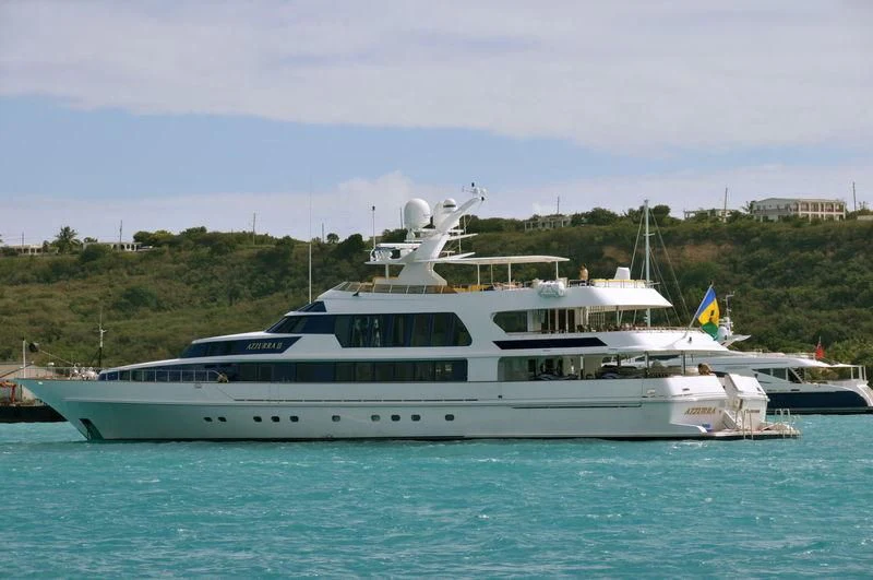 a white yacht on the water aboard AZZURRA II Yacht for Sale