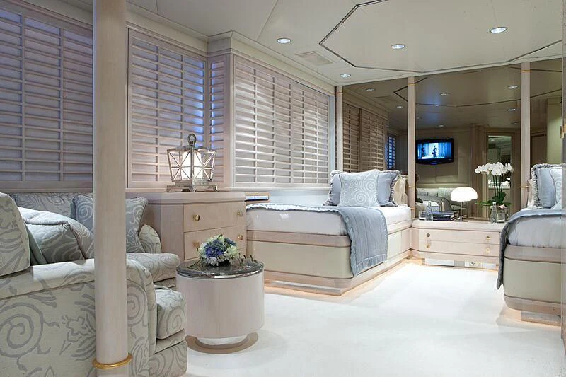 a living room with a large mirror aboard AZZURRA II Yacht for Sale