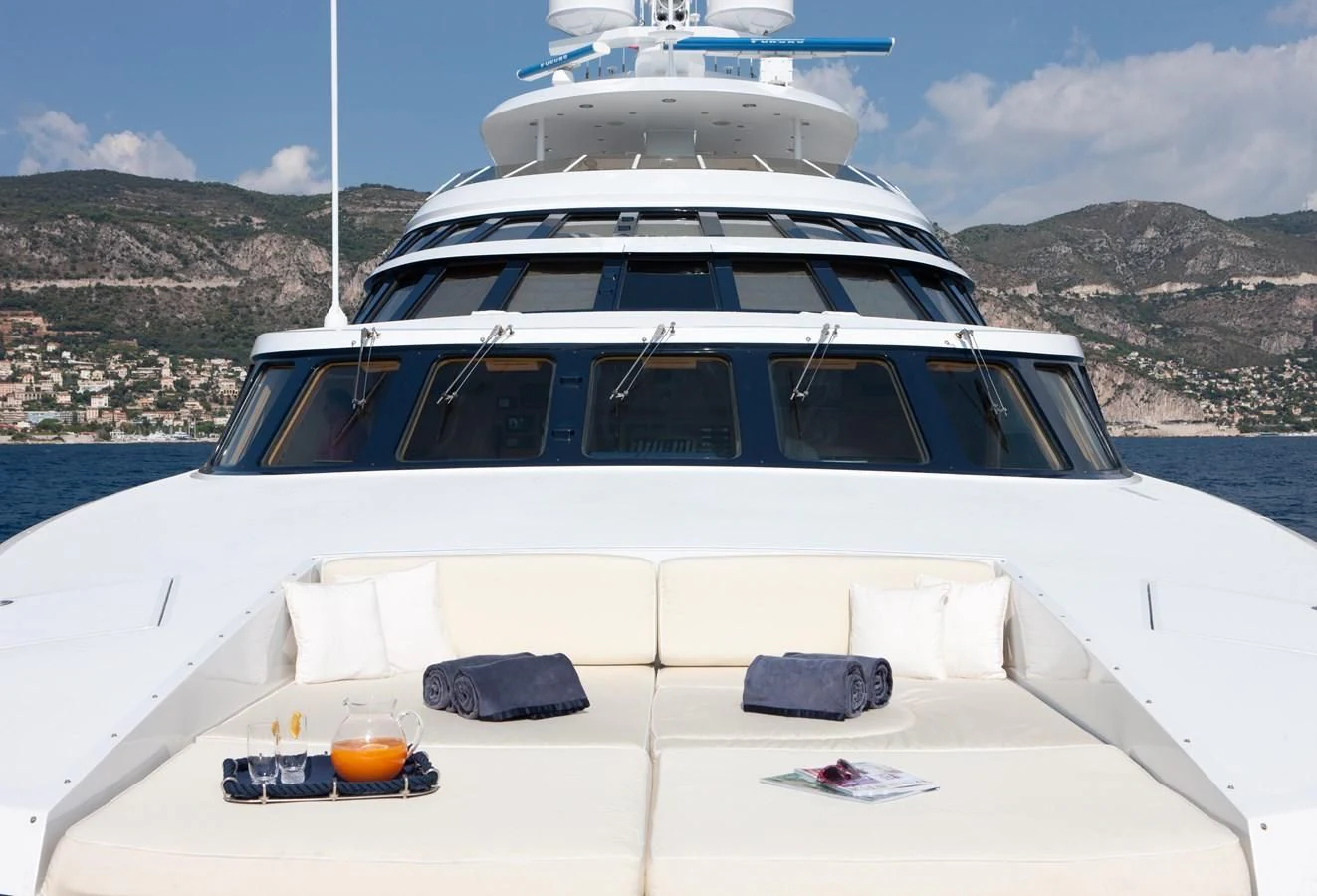 a white yacht on the water aboard AZZURRA II Yacht for Sale