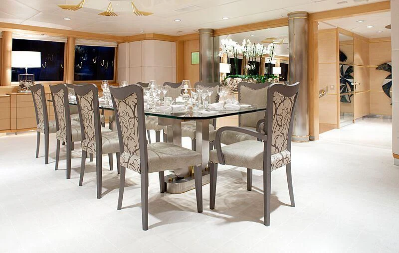 a dining table set for a meal aboard AZZURRA II Yacht for Sale