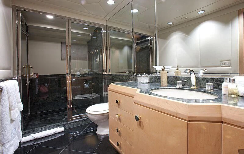 a bathroom with a large glass shower aboard AZZURRA II Yacht for Sale