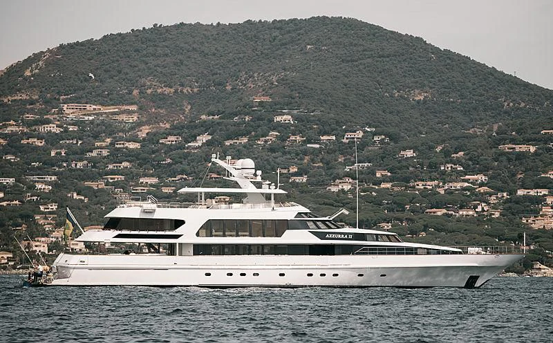 a white yacht in the water aboard AZZURRA II Yacht for Sale