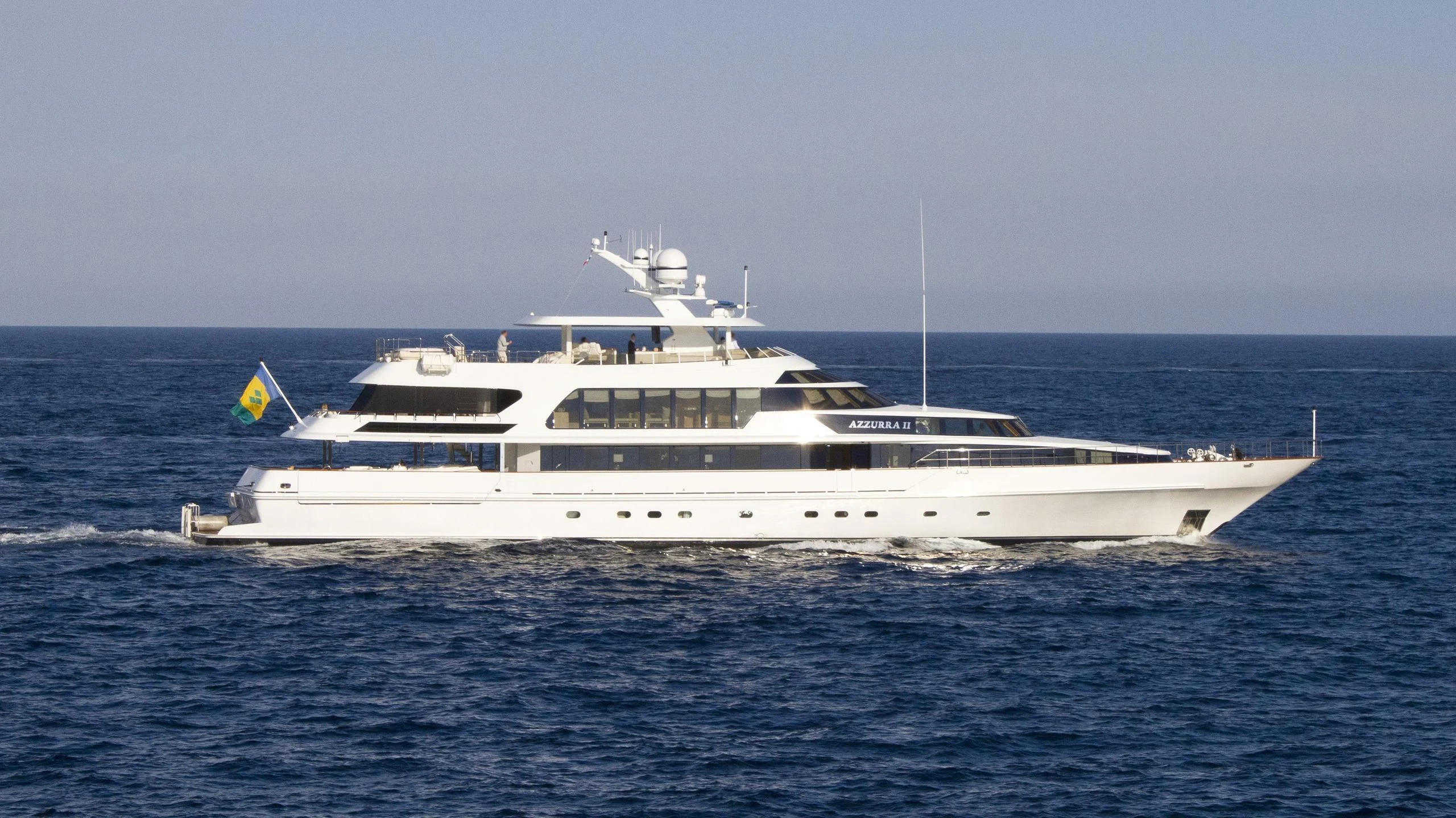 a white yacht in the water aboard AZZURRA II Yacht for Sale