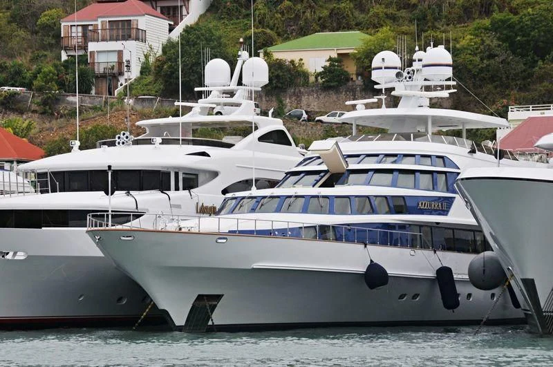 a group of boats in a harbor aboard AZZURRA II Yacht for Sale