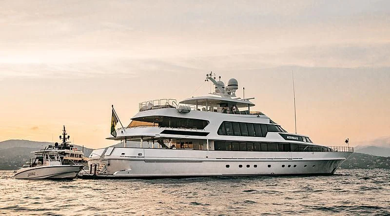 a couple of large boats in the water aboard AZZURRA II Yacht for Sale
