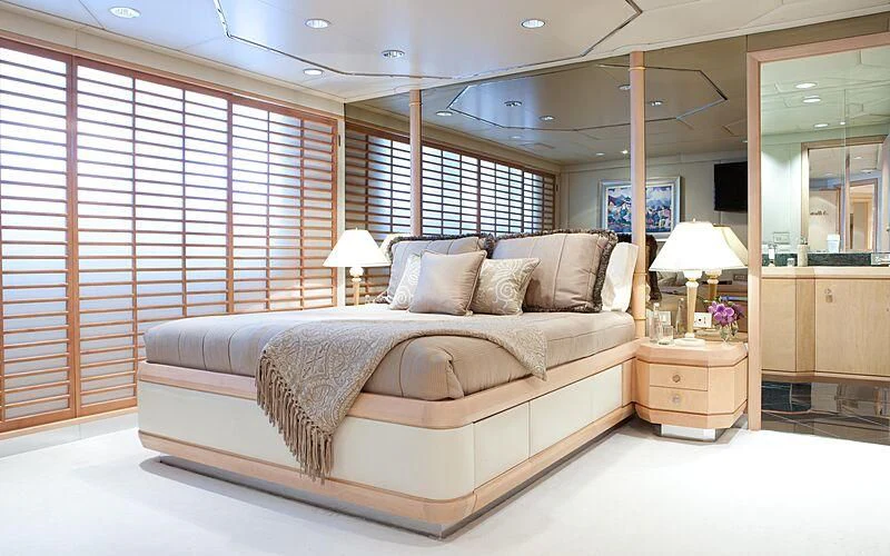 a bed in a room aboard AZZURRA II Yacht for Sale
