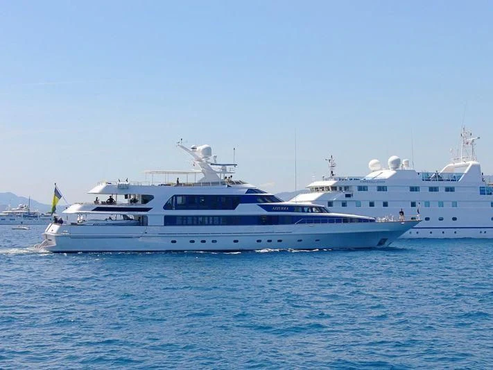 a couple of boats in the water aboard AZZURRA II Yacht for Sale