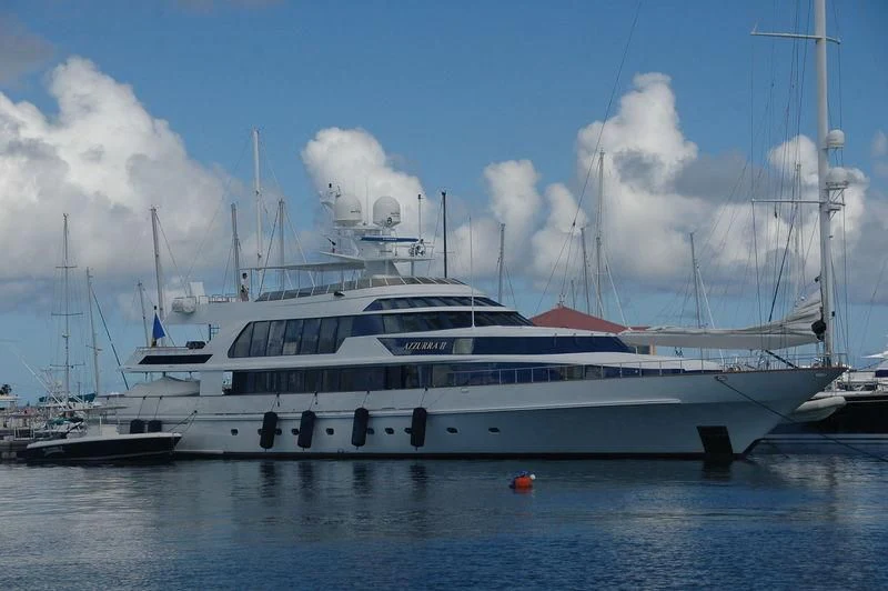 a white yacht in the water aboard AZZURRA II Yacht for Sale