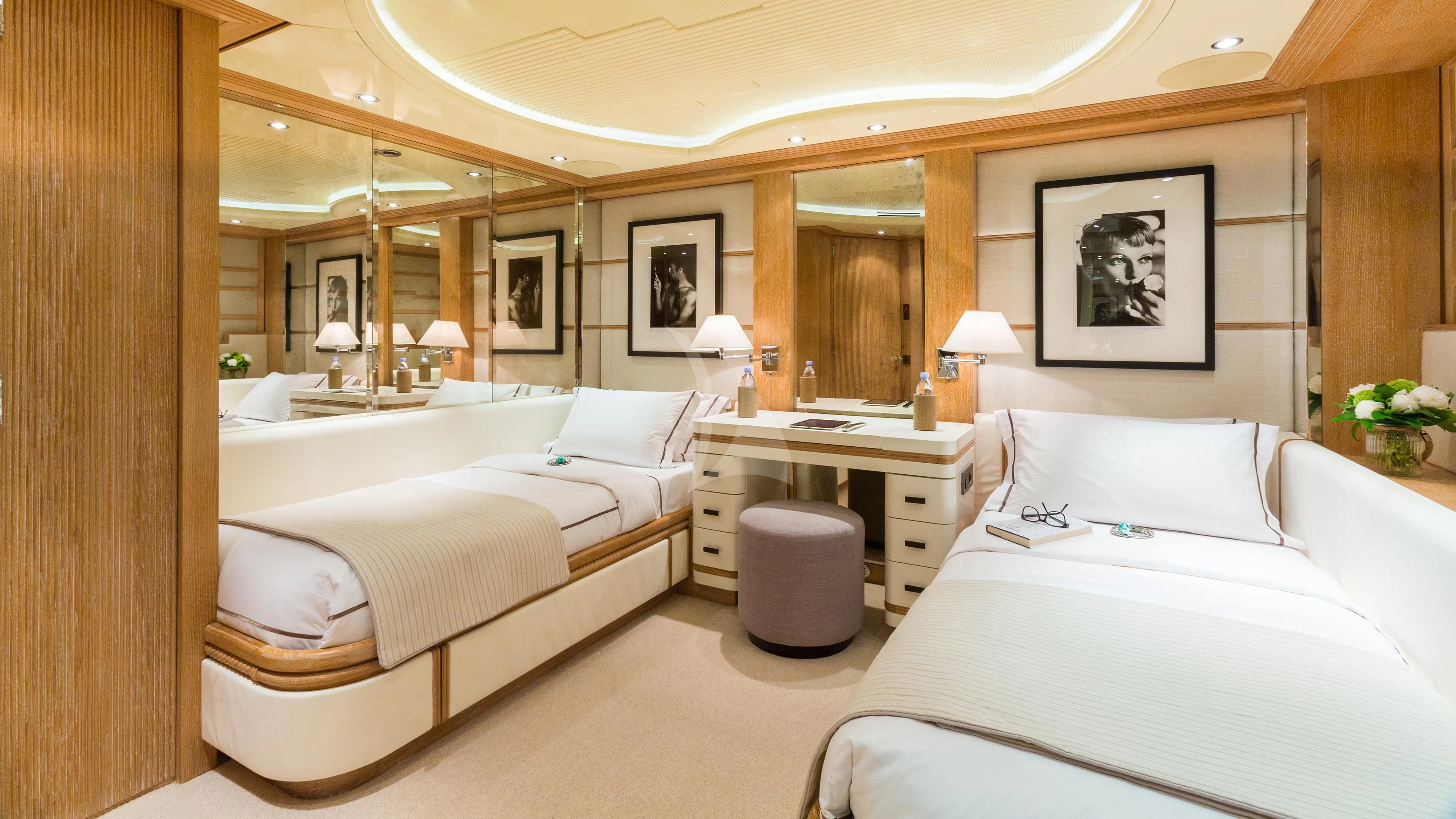 a room with two beds aboard AIR Yacht for Sale