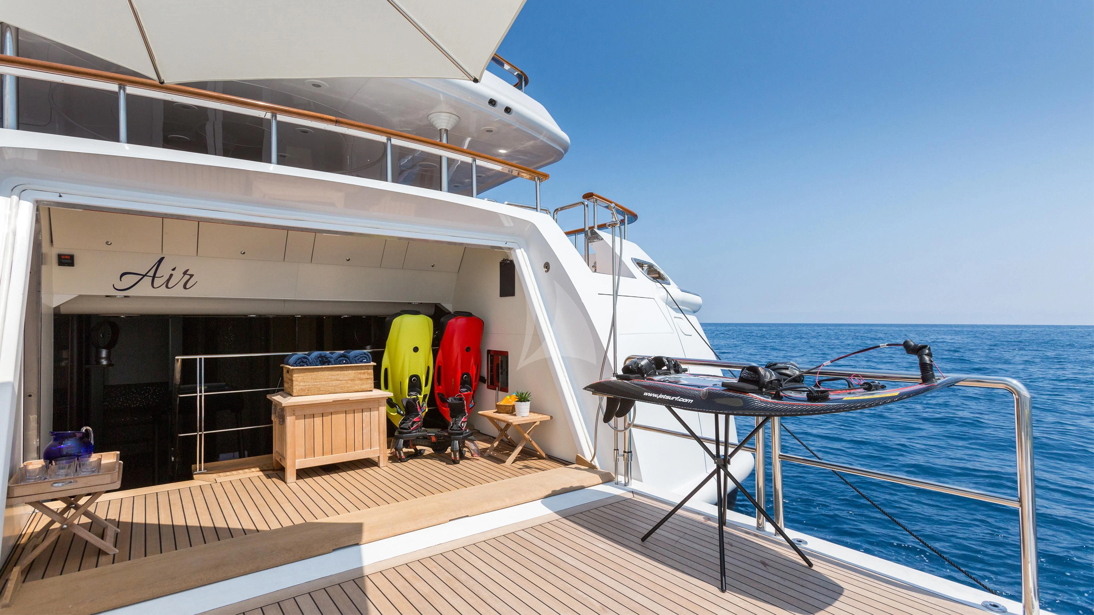 a boat on a dock aboard AIR Yacht for Sale