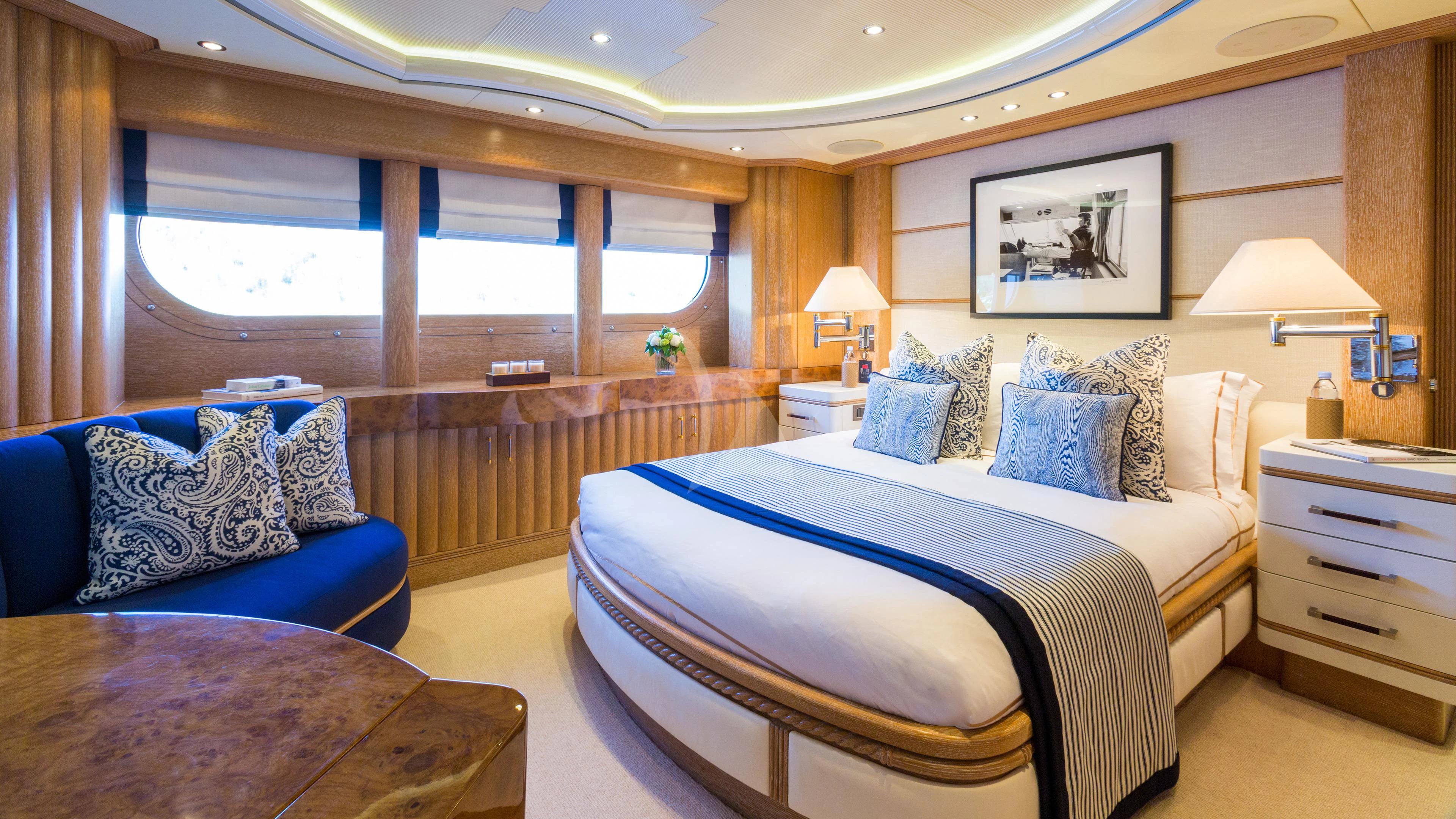 a large bedroom with a large bed aboard AIR Yacht for Sale