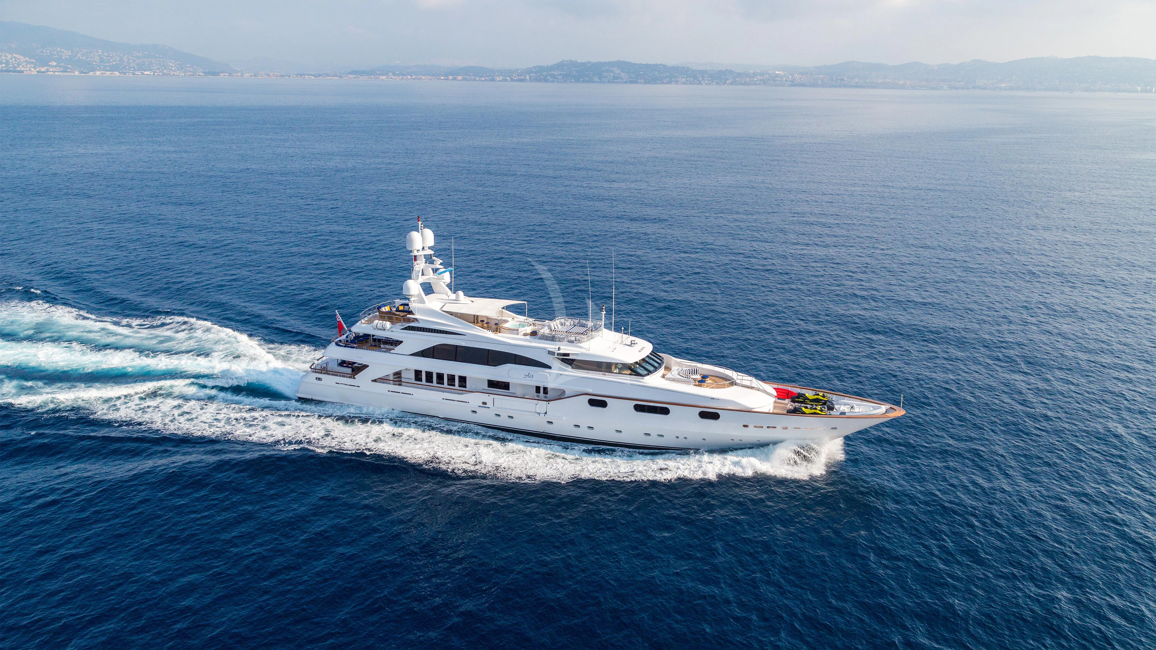a white yacht in the ocean aboard AIR Yacht for Sale