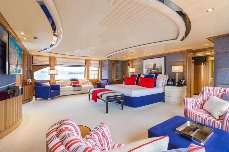 a living room with a large window aboard AIR Yacht for Sale