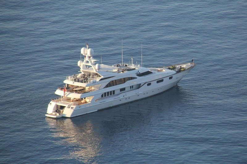 a large white ship in the water aboard AIR Yacht for Sale