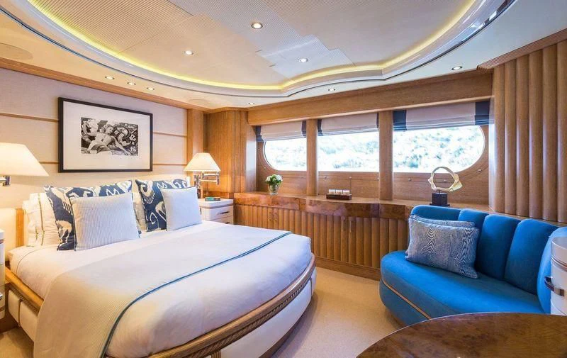 a large bedroom with a large bed aboard AIR Yacht for Sale