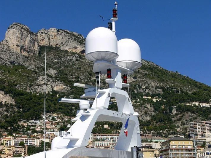 a white building with a white tower and a white dome on top aboard AIR Yacht for Sale