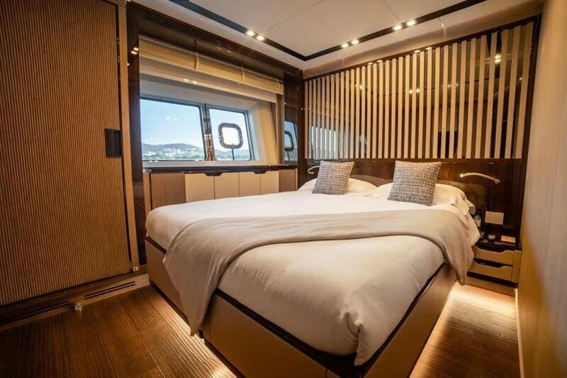 a room with two beds aboard EDEN Yacht for Sale