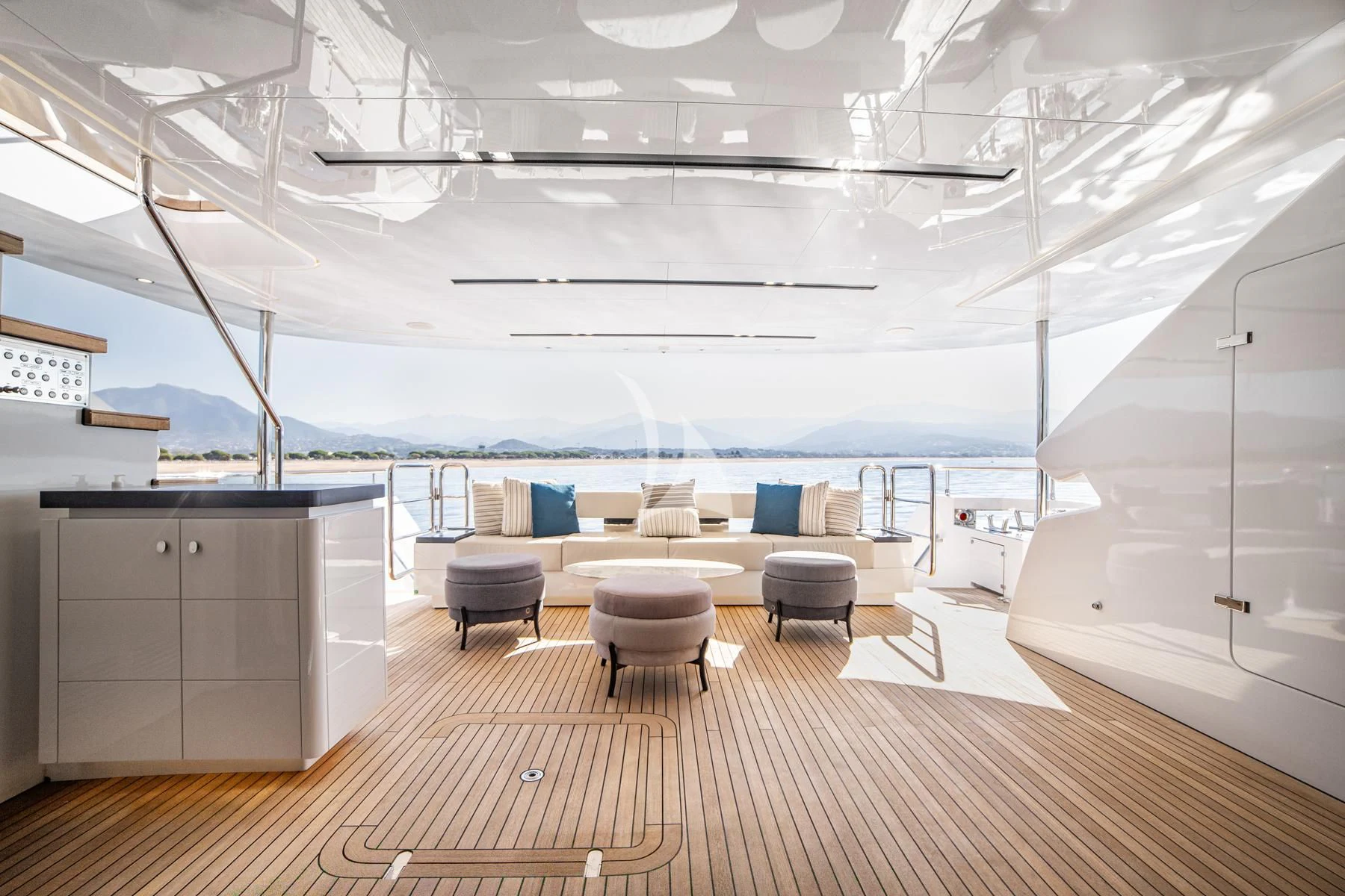 a room with a couch and a table and chairs aboard EDEN Yacht for Sale