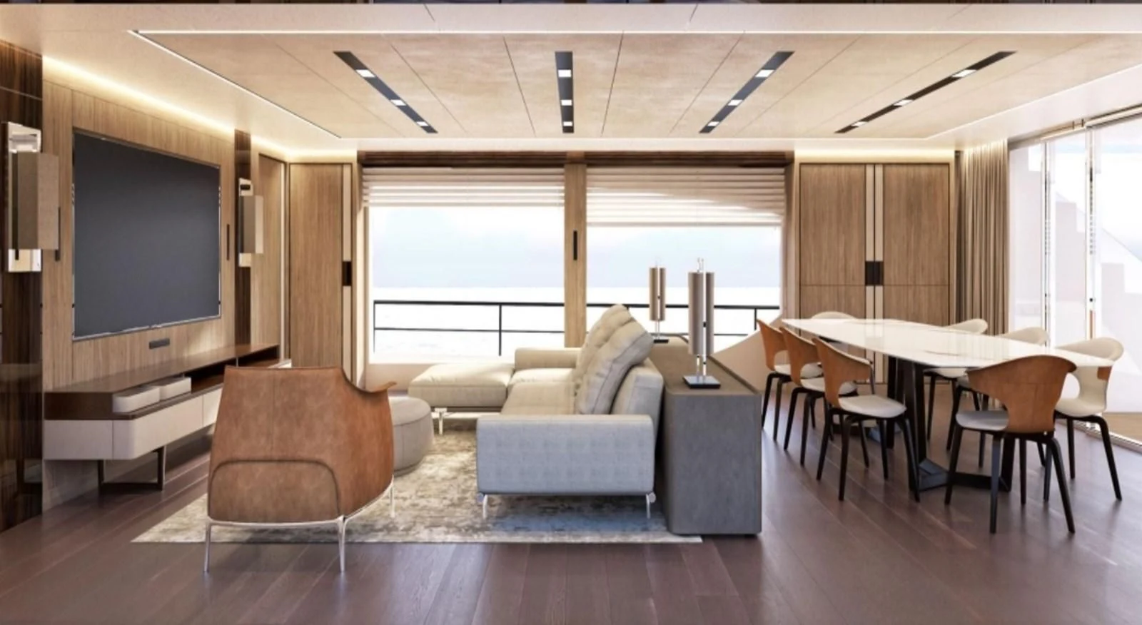 a room with a tv and chairs aboard EDEN Yacht for Sale