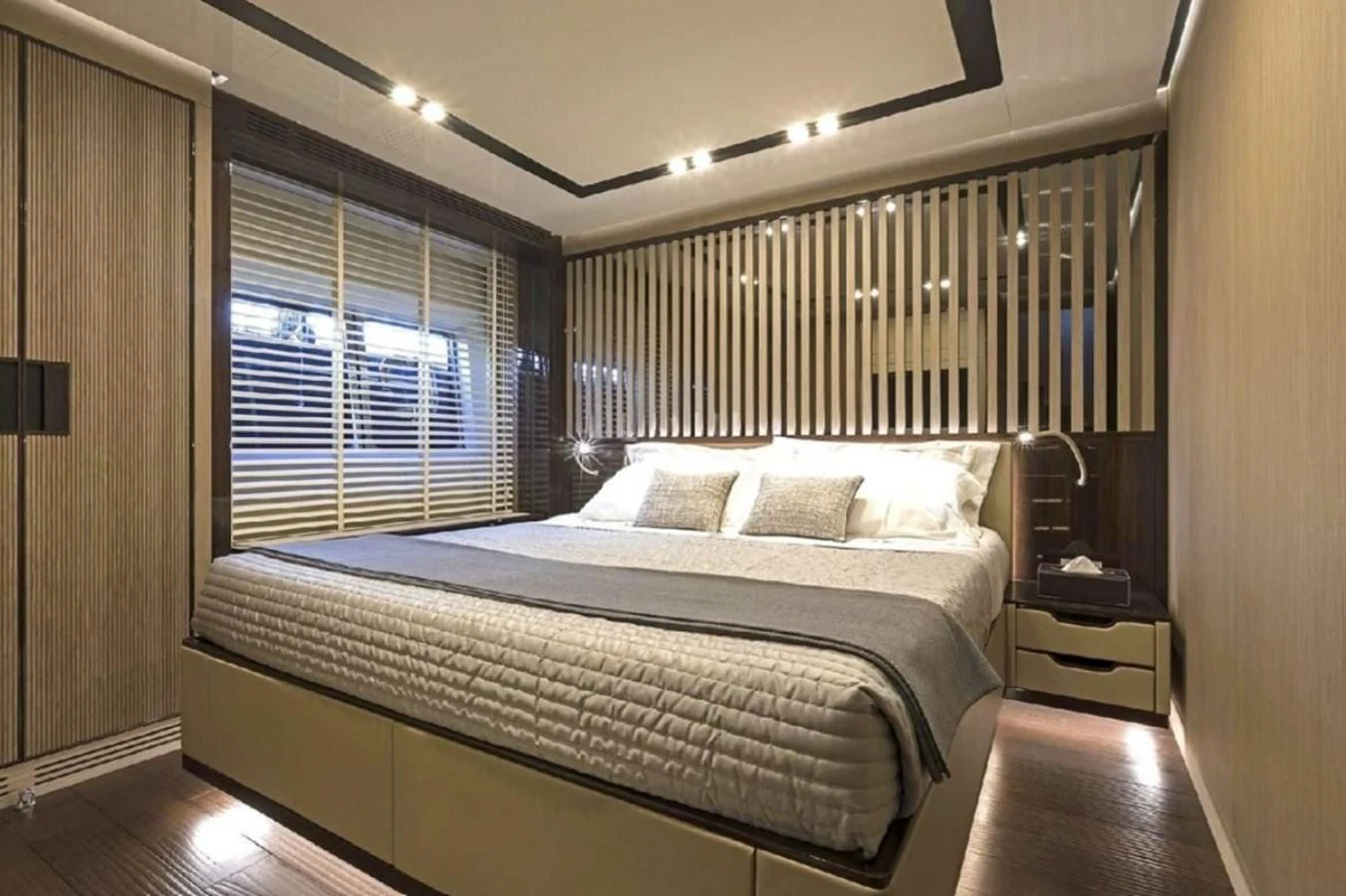 a bed in a room aboard EDEN Yacht for Sale
