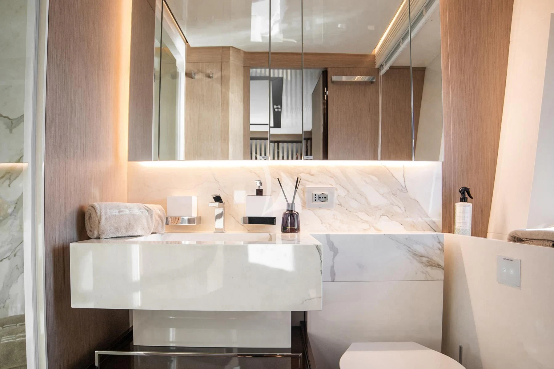 a bathroom with a sink and a mirror aboard EDEN Yacht for Sale