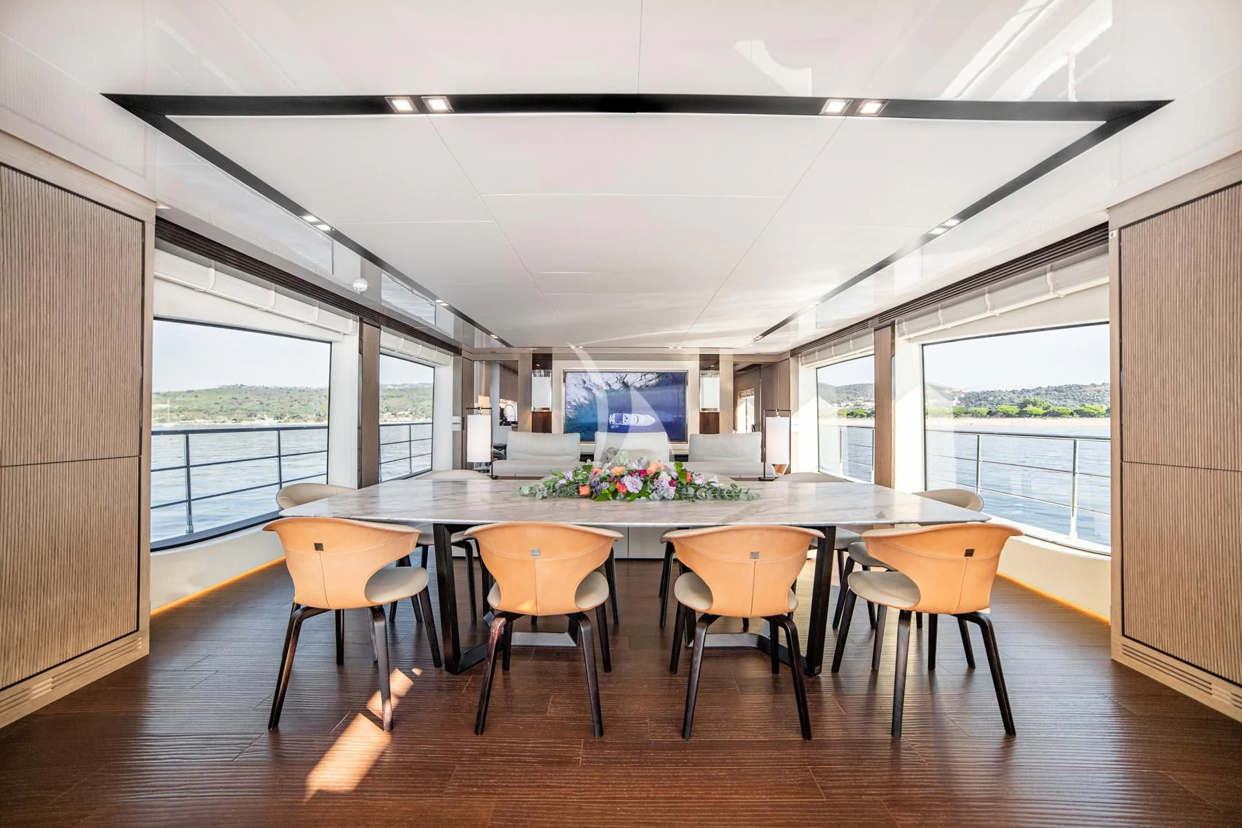 a large kitchen with a table and chairs aboard EDEN Yacht for Sale