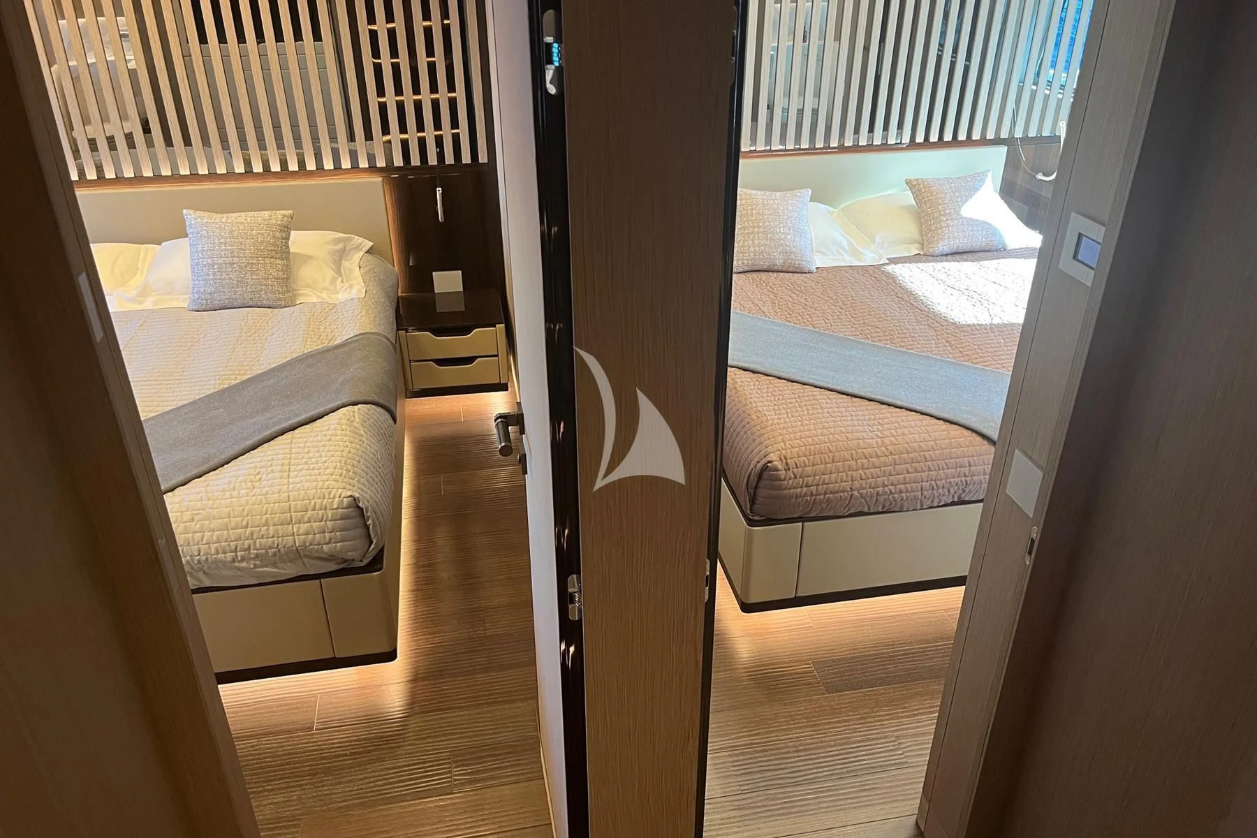 a room with a bed and a window aboard EDEN Yacht for Sale