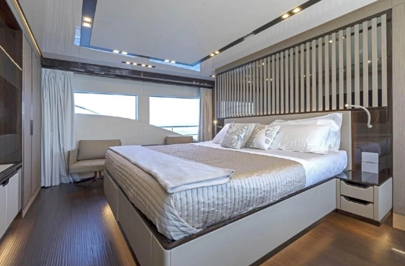 a bed in a room aboard EDEN Yacht for Sale