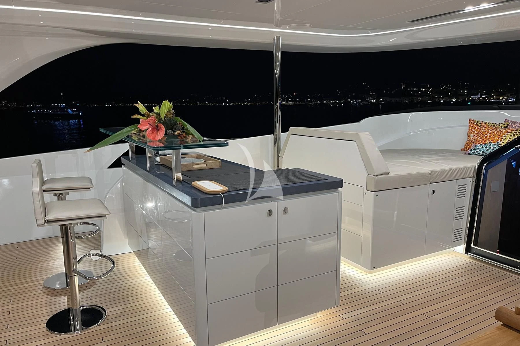 a room with a table and chairs aboard EDEN Yacht for Sale