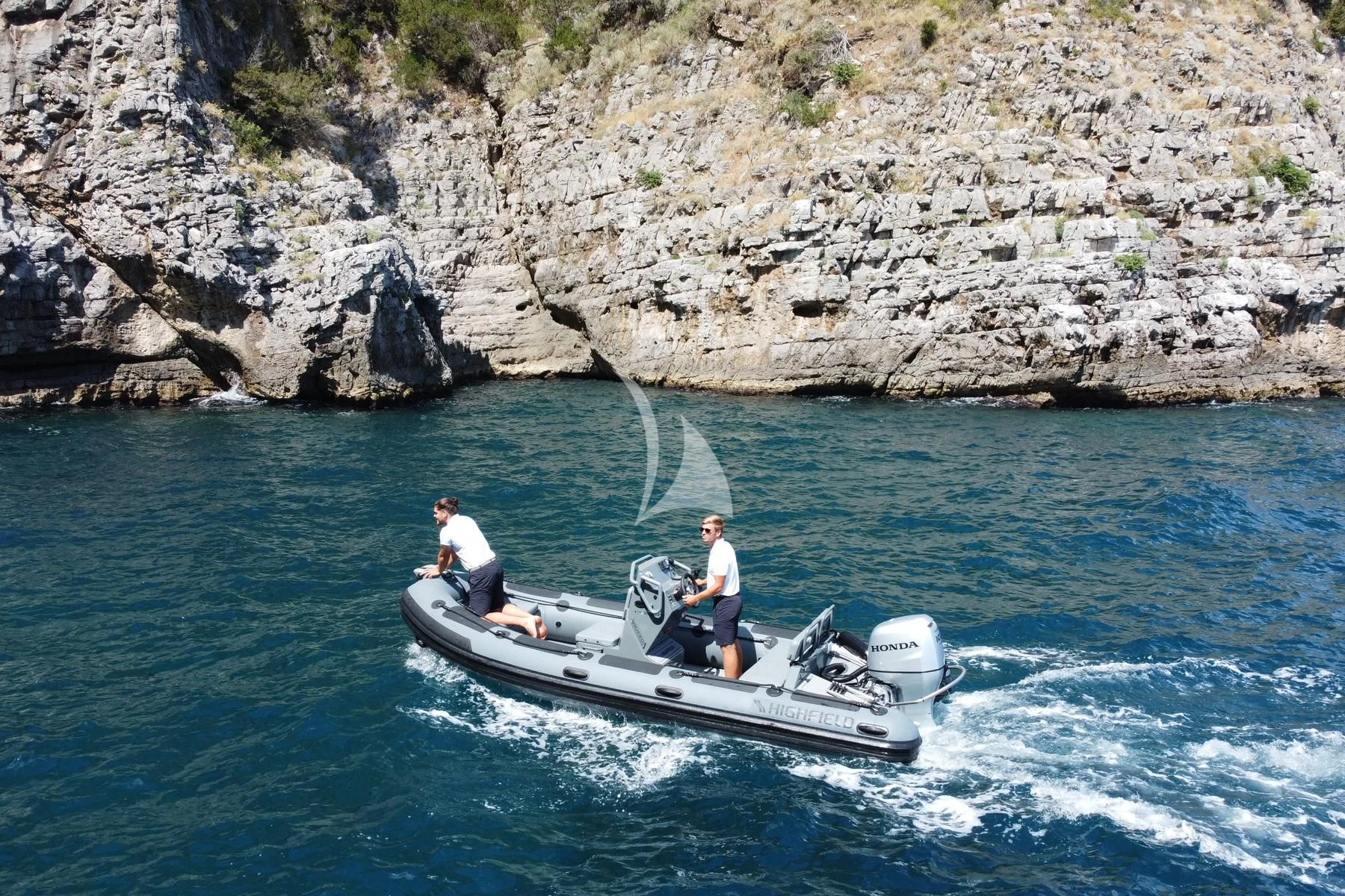 a couple men on a boat aboard EDEN Yacht for Sale