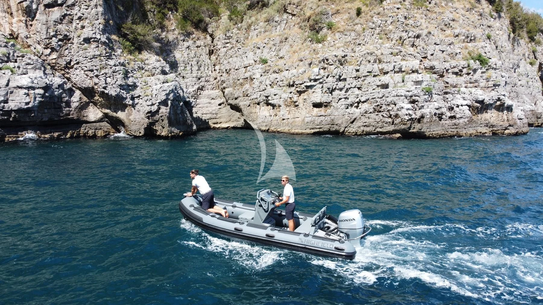 a couple men on a boat aboard EDEN Yacht for Sale