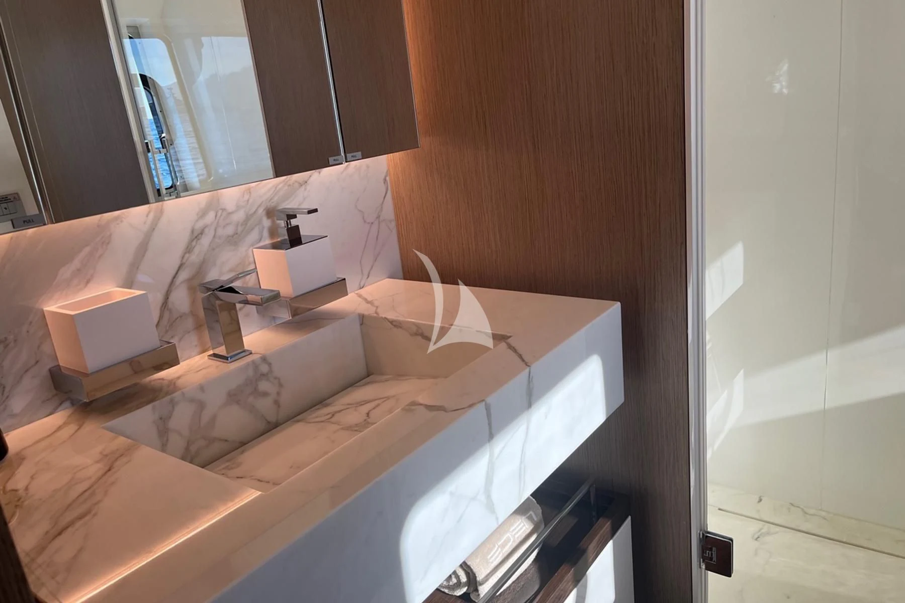 a bed with a white sheet aboard EDEN Yacht for Sale