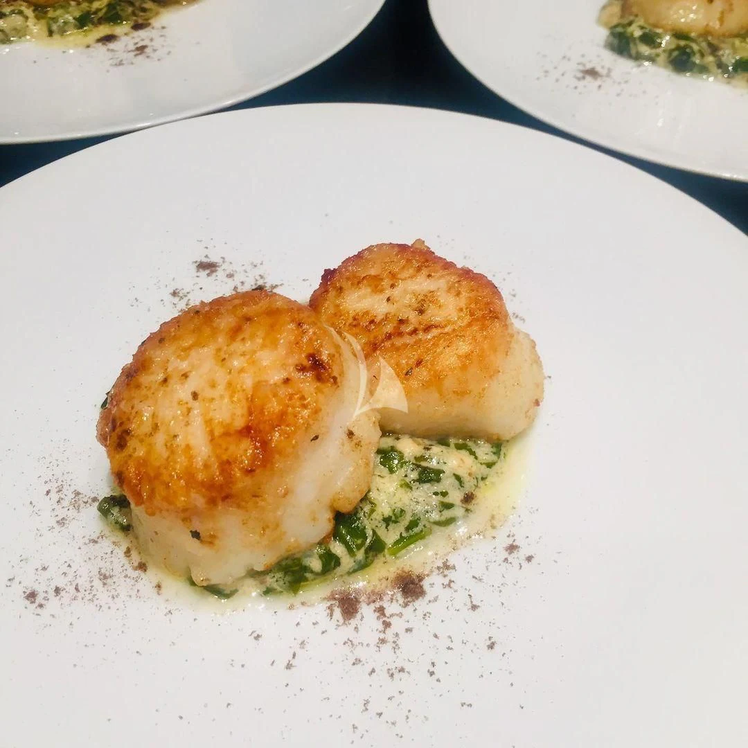 a piece of food on a plate aboard EDEN Yacht for Sale