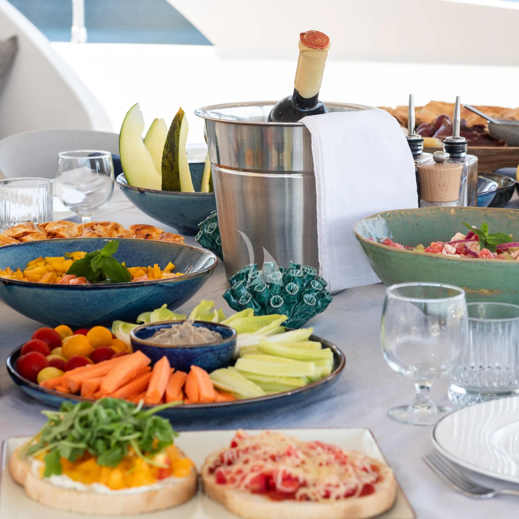 a table full of food aboard EDEN Yacht for Sale