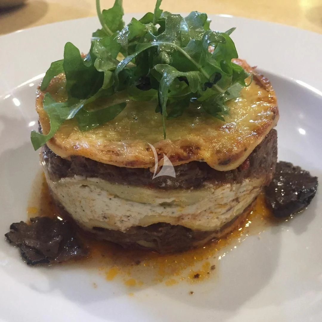 a plate of food aboard EDEN Yacht for Sale