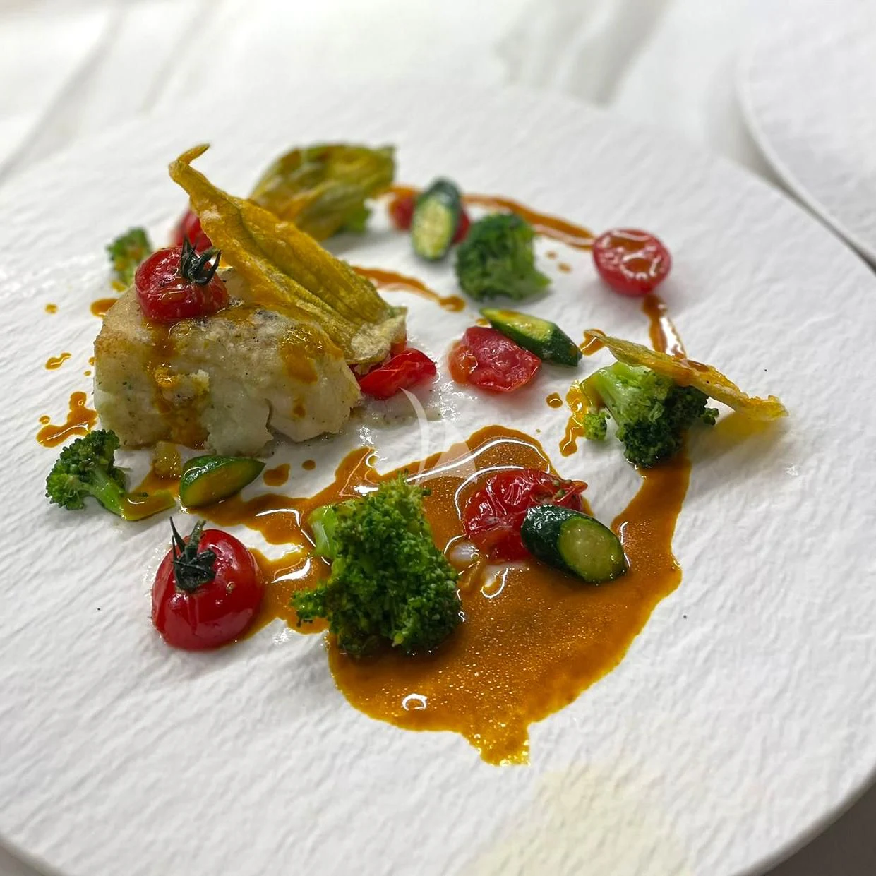 a plate of food aboard EDEN Yacht for Sale