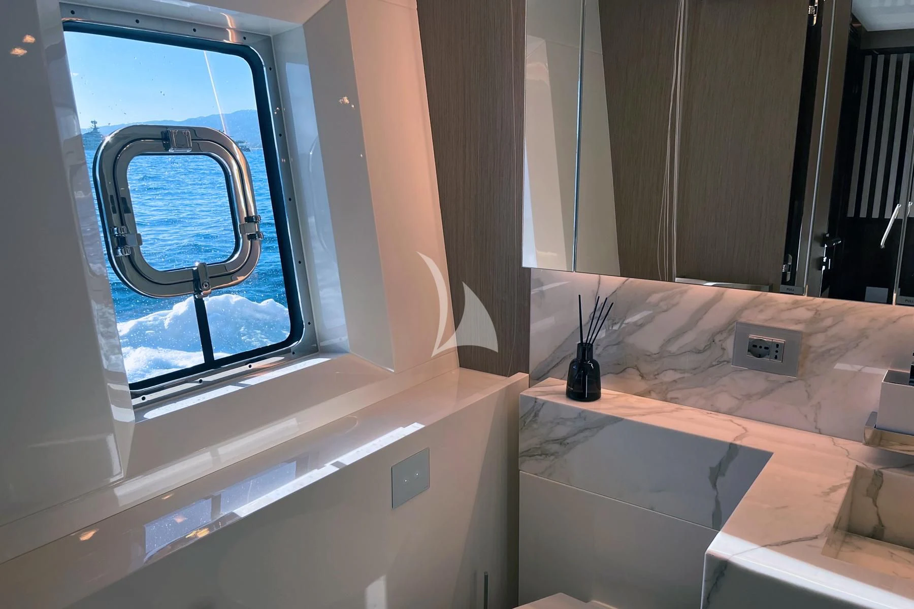 a window with a mirror aboard EDEN Yacht for Sale
