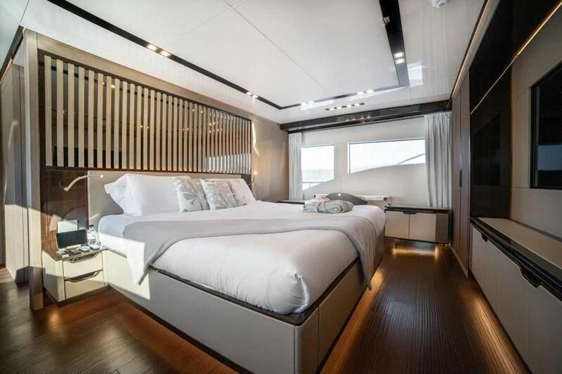 a bedroom with a large bed aboard EDEN Yacht for Sale