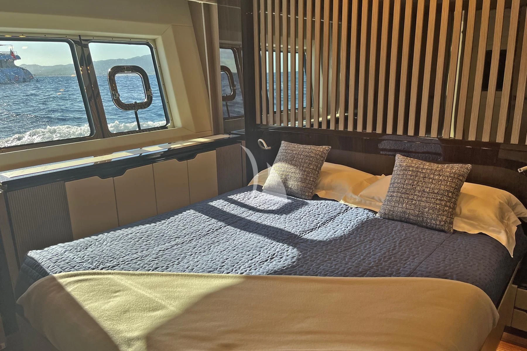 a bed with pillows aboard EDEN Yacht for Sale