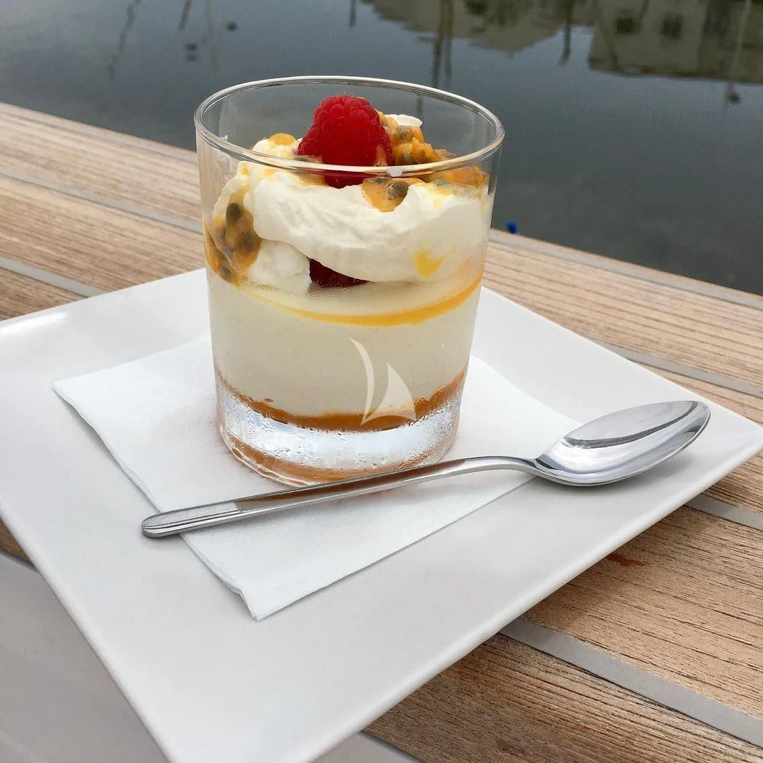 a dessert on a plate aboard EDEN Yacht for Sale