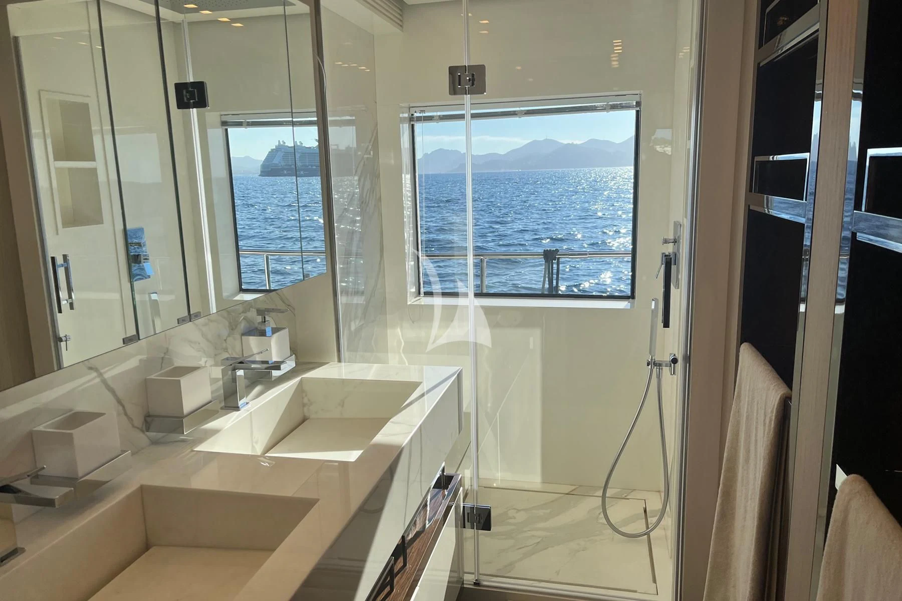 a bathroom with a large window aboard EDEN Yacht for Sale