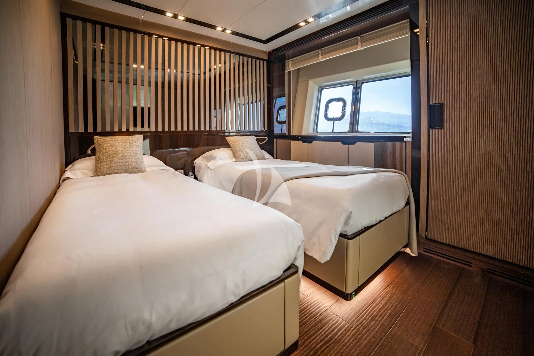 a room with two beds aboard EDEN Yacht for Sale