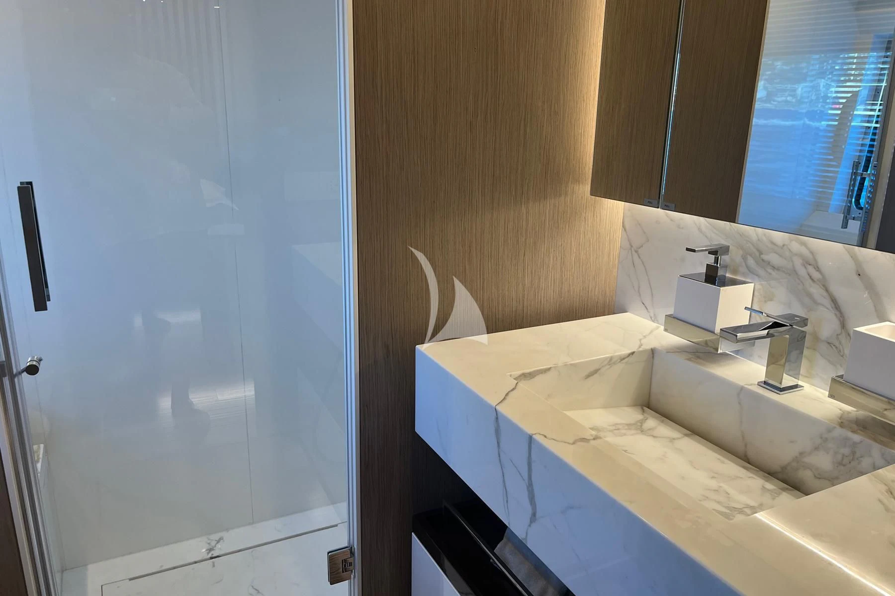 a bathroom with a sink and a mirror aboard EDEN Yacht for Sale